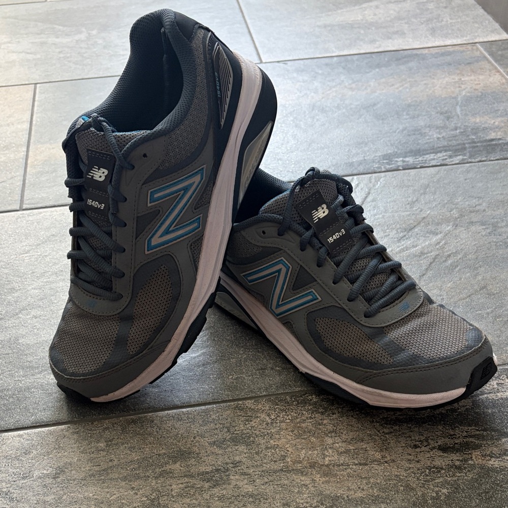 New Balance 1540v3 Gray Athletic Shoes with Blue Accents